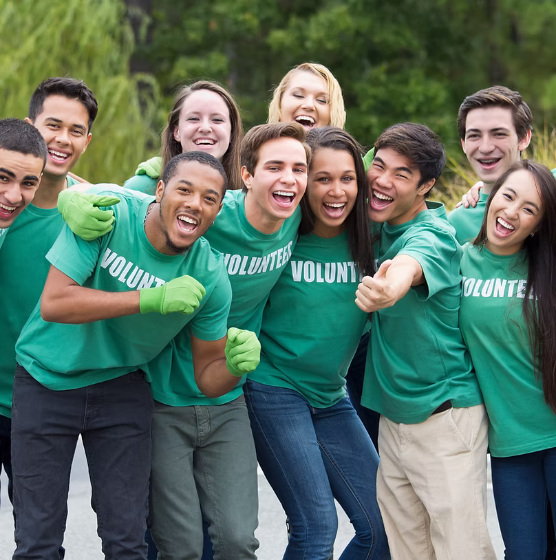 Community volunteers gathered together outdoors.